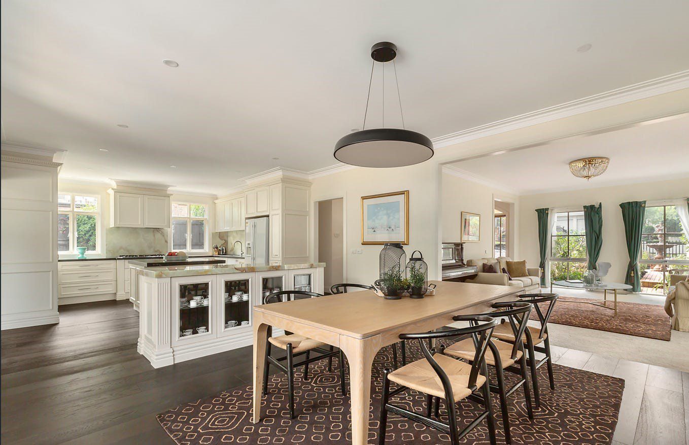 Elegant Open-Plan Kitchen and Dining Area With Soft Cream Walls