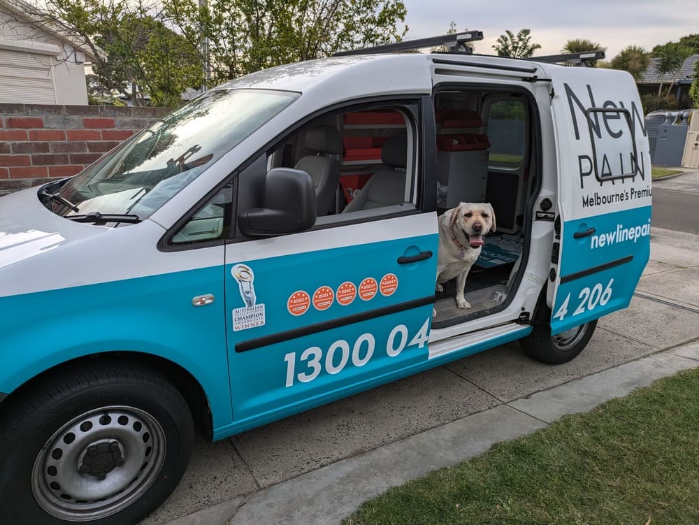 Newline Painting service van parked in a Melbourne suburb